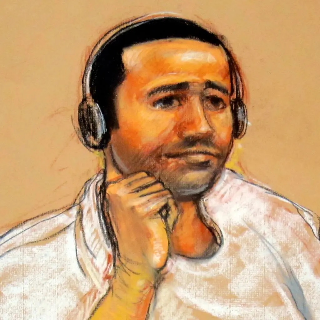 A courtroom rendering of Abd al Rahim al-Nashiri. He is wearing headphones and a light-colored shirt.