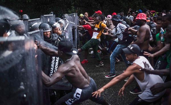 Mexican National Guard attacks caravan of thousands of Central America immigrants.