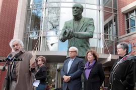  Above: Cherif Bassiouni, center, speaking at a rally at DePaul. 