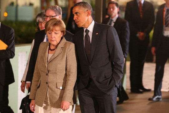 BRISBANE, AUSTRALIA - NOVEMBER 15:  United States President Barack Obama and Germany's Chancellor Angela Merkel arrive at The Queensland Gallery of Modern Art on November 15, 2014 in Brisbane, Australia. World leaders have gathered in Brisbane for the annual G20 Summit and are expected to discuss economic growth, free trade and climate change as well as pressing issues including the situation in Ukraine and the Ebola crisis. (Photo by Chris Hyde/Getty Images)